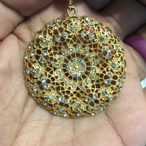 Gold-colored medallion earrings